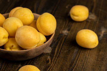 ripe soft apricot fruits on the cutting board