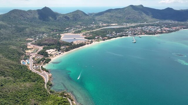 Bai tam An Hai Beach And Ha An Hai Lake In Con Dao Island In Vietnam. - aerial shot