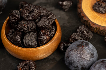 ripe purple plums and dried plums