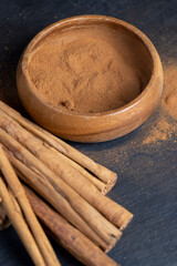 cinnamon tree bark with golden powder