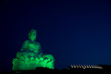 Majestic Buddha Statue Under Twilight Sky