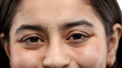 Woman's eyes, close-up, on a white background