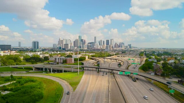 Aerial Establishing Downtown Houston Texas, skyline Traffic Skyscraper buildings, famous American city, Texas 288 freeway. Drone shoot the Texas 288 overlooking Houston Downtown. Houston Intro