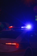 Police car in the city at night.
