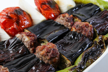 eggplant kebab, meatballs and onions. Meat dish with eggplant