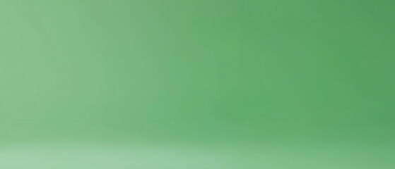 Fototapeta premium Smooth gradient green background for design or presentation use.