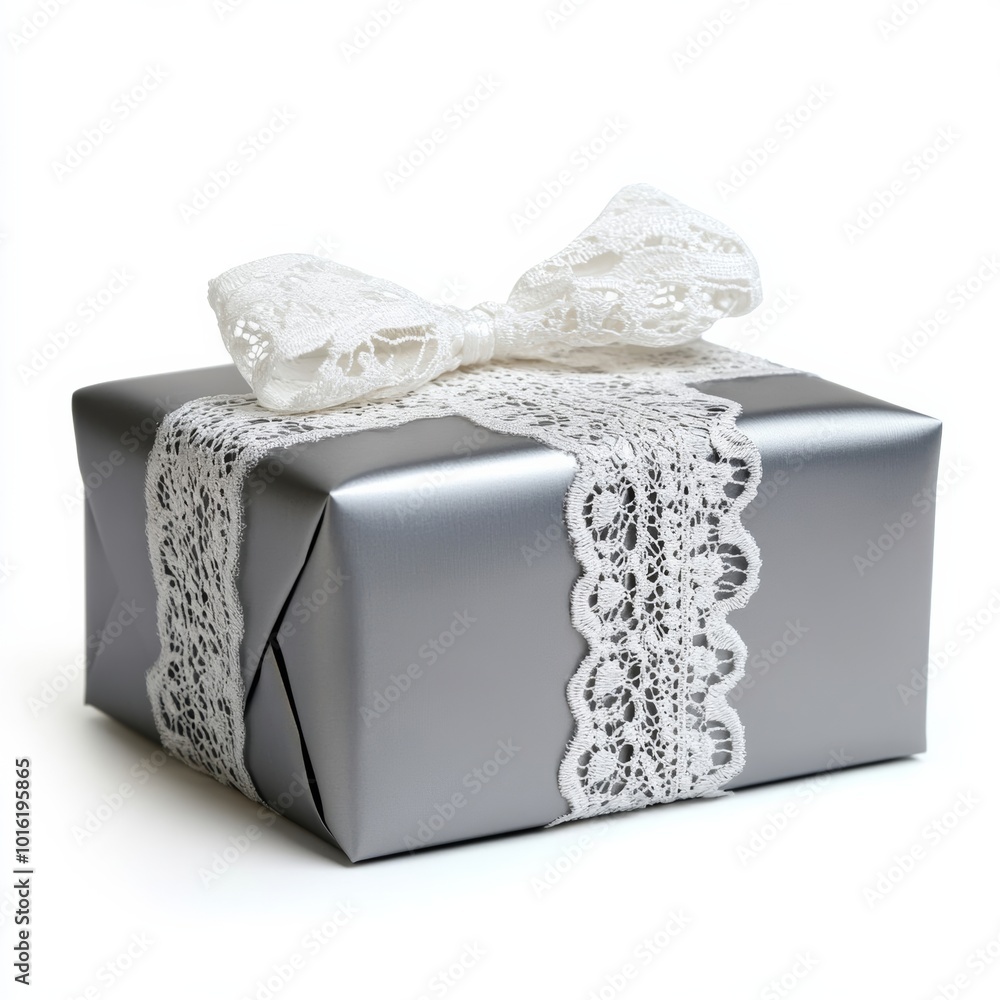 Sticker Elegant Christmas gift in metallic silver wrap with a delicate white lace bow isolated on white background 