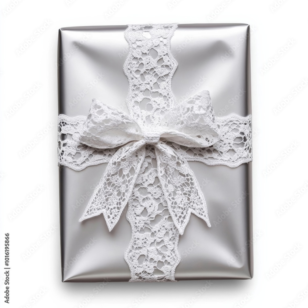 Sticker Elegant Christmas gift in metallic silver wrap with a delicate white lace bow isolated on white background 