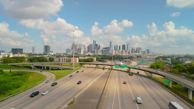 Drone shot Texas freeway 288 leading to downtown Houston. City of Houston northbound from Texas 288, I69 and I45 intersection. Aerial shot Houston transportation to downtown.
