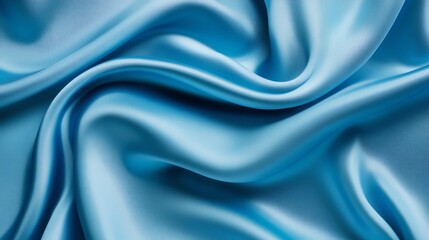 Obraz premium Elegant blue satin drapery with soft, smooth texture, perfect for luxury fashion backdrop