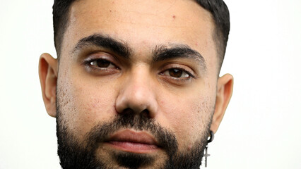 Fototapeta premium Man's face, close-up, on a white background