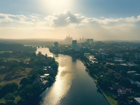 High angle view of Parramatta river in Western Sydney, Australia. Cityscape with river flowing through, surrounded by modern buildings, tower, and city skyline.