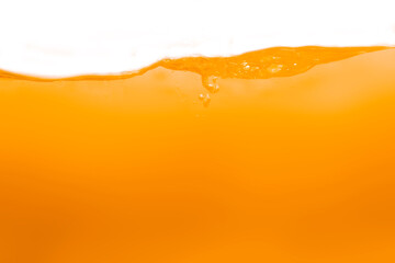 Orange water or juice and splash waves for nature