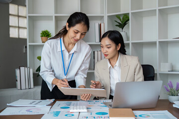 Professional Business Meeting in Modern Office with Diverse Team Collaborating on Project Strategy and Analyzing Financial Reports