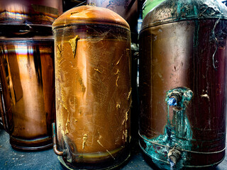 Old copper cylinders, water tanks, taken from a loft or airing cupboard during a new boiler swap,...