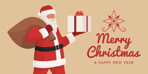 Happy Santa Claus carrying a Christmas gift