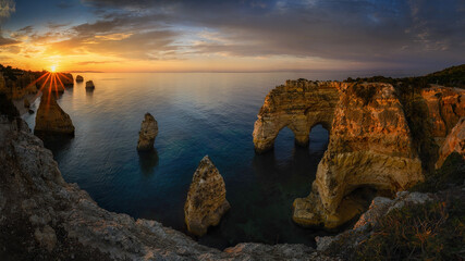 Praia da Mesquita sunrise with rocks and colour sky © Jaro