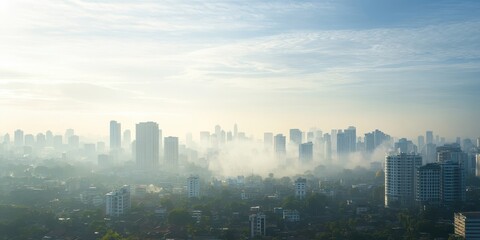 Fototapeta premium A stunning city skyline shrouded in mist, capturing the beauty of urban life at dawn with soft clouds and serene atmosphere.