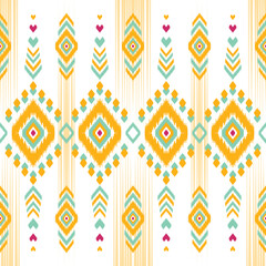 Traditional ikat patterns with bright geometric shapes in shades of blue, green, yellow and orange are perfect for textile design, home decor, rugs and fashion. Inspired by indigenous and tribal