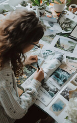 Manifesting Dreams: Person Crafting Vision Board with Motivational Images and Words for Setting Intentions
