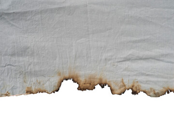Decayed fabric with a burnt edge on an isolated background. Halloween horror background blank...