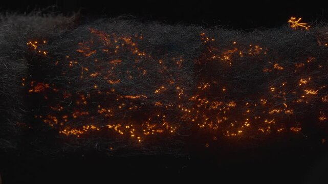 Macro shot of steel wool burning. Great for a background or could look like Neurons firing in a brain.