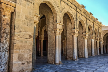 The Great Mosque of Kairouan, also known as the Mosque of Uqba, is a significant Islamic landmark built in the 7th century. It features an ancient minaret, marble columns, and beautiful domes. 