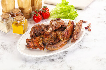 Roasted duck wings with sauce