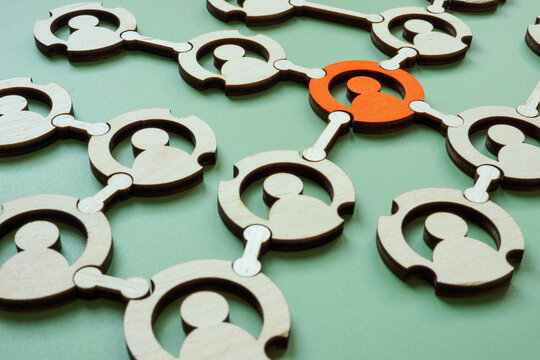 Figure connected to others. Represents community and shared goals.