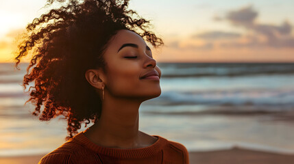 Black woman, happy and meditation with breathing on beach for fresh air or spiritual yoga in nature. Faith, person or peaceful by ocean for sunset worship, holistic mindset or zen with mockup space