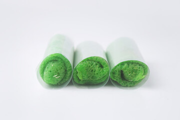 Close up photo of a traditional Indonesian food often called Dadar Gulung Kelapa