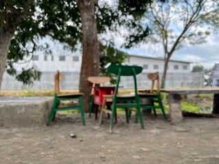 blur of green bench in the park
