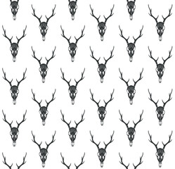 Vector seamless pattern of hand drawn sketch doodle deer skull isolated on white background