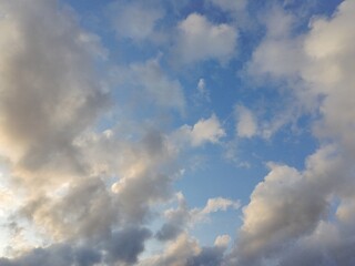 beautiful cloudy sky sunlight from the side, dramatic feel, it's going to rain