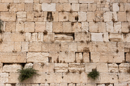 Detail of a broad section of the rows of stone comprising the Western Wall in the Old City of Jerusalem, Israel.