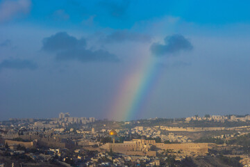 A rainbow arches over the Dome of the Rock mosque on the Temple Mount in the Old City of Jerusalem, Israel.