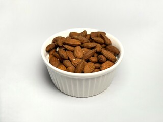 Roasted almond in a white bowl
