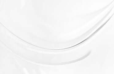 White gray satin texture that is white silver fabric silk background with beautiful soft blur pattern natural.