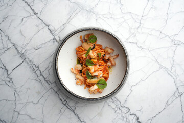 Pasta and tiger prawns in tomato sauce. Italian pasta with shrimps