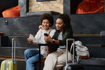 Two happy travelers enjoy trip, excited for their adventure ahead.