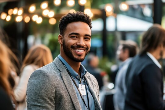 A young businessman confidently wears his ID card to attend a networking event. His commitment to building meaningful business relationships. - Powered by Adobe