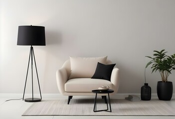A modern beige armchair with black and white throw pillows in a minimalist living room setting with a black floor lamp.