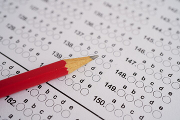 Answer sheets with pencil drawing fill to select choice, education.