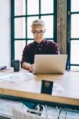 Asian male and female students preparing to university examination using 4g wireless internet on laptop computer and other equipment for making research of information, concept of collaboration