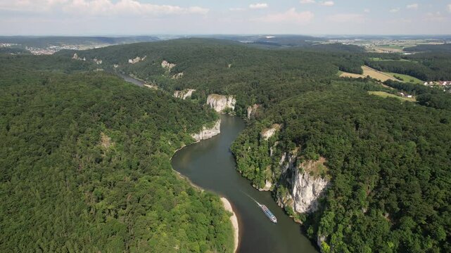 Drone flight over Kloster Weltenburg in Donau river, Germany. Panoramic view of the landscape