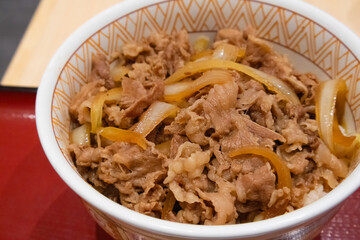Gyudon (Japanese Beef & Rice Bowls),  is a savory donburi dish of thin pieces of tender fatty beef, onions, and a sauce of mirin and soy, served over rice