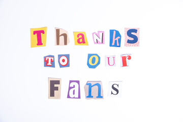 Fun cut out newspaper style typescript with words Thanks to our Fans. Isolated on clean white...