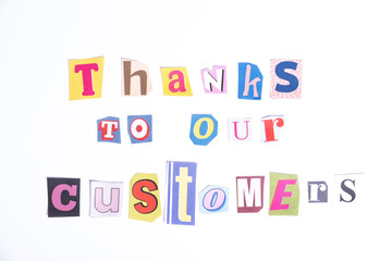 Fun cut out newspaper style typescript with words Thanks to our Customers. Isolated on clean white background. Gratitude and Thanks concept.