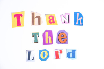 Fun cut out newspaper style typescript with phrase Thank The Lord. Isolated on clean white background. Gratitude and Thanks concept.