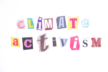 Phrase Climate Activism spelled in cut out newspaper style typography isolated on white background.